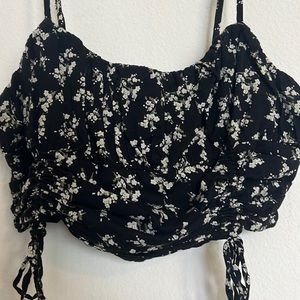 Urban outfitters, black cropped tank with ties rousing and floral detail. Large